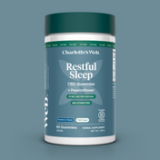Product Image for Charlotte's Web Restful Sleep CBD Gummies container on a blue background