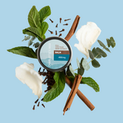 Product Image for Balm container with cinnamon sticks, mint leaves, and eucalyptus on a light blue background