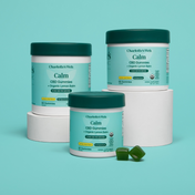 Product Image for Charlotte&#39;s Web Calm CBD Gummies containers on a teal background