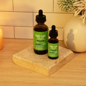 Product Image for Two bottles of &#39;Daily Care&#39; on a stone coaster with a neutral background
