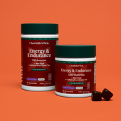 Product Image for Two containers of Charlotte&#39;s Web Energy &amp; Endurance CBD Gummies on an orange background