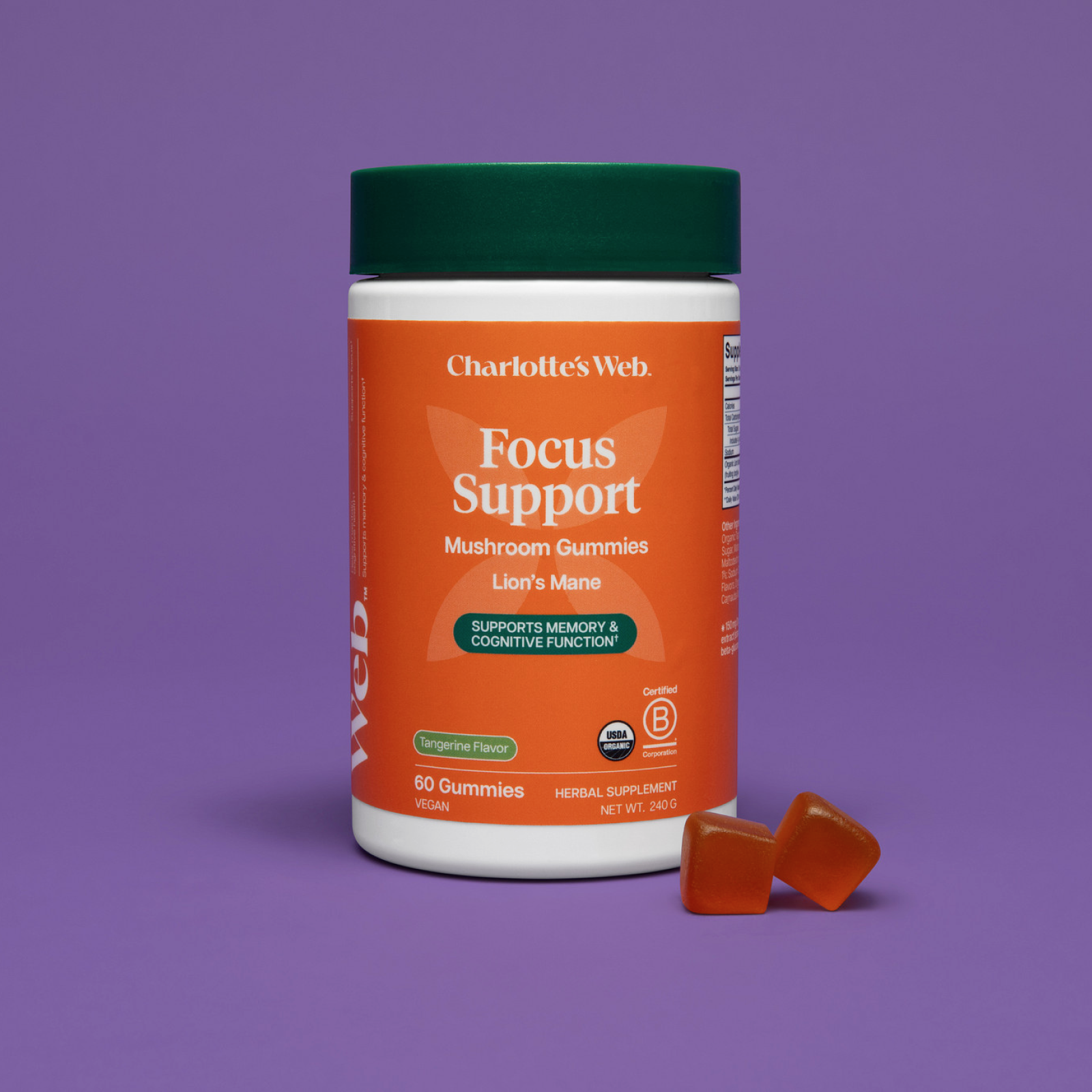 Product Image for Charlotte&#39;s Web Focus Support mushroom gummies container with two gummies on a purple background